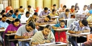 Rows of candidates seated and writing IAS exam